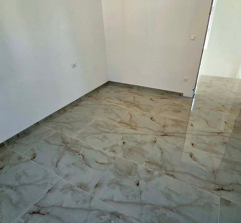 Bright, spacious room with marble floors and white walls in Ulcinj&mdash;prime Montenegro real estate by ekosphere doo on immorenta.me.