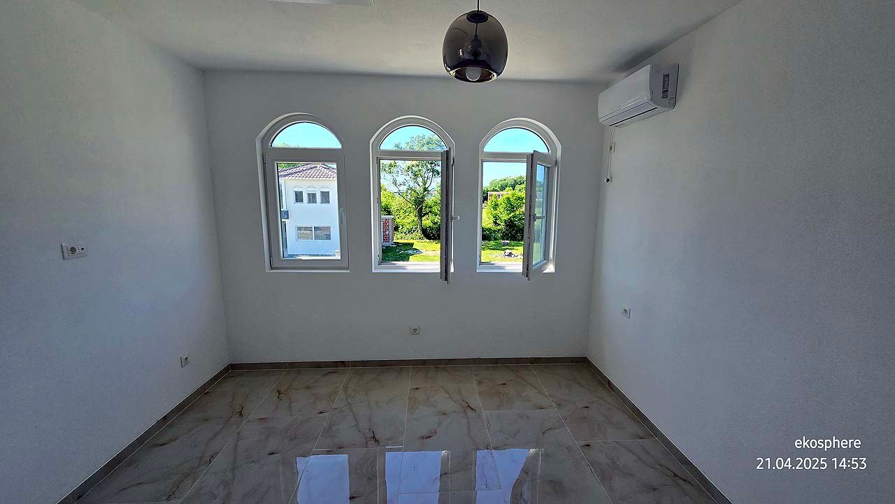 Bright, investment-ready room in Ulcinj, Montenegro with arched windows, views, AC; exclusive to immorenta.me by ekosphere doo.