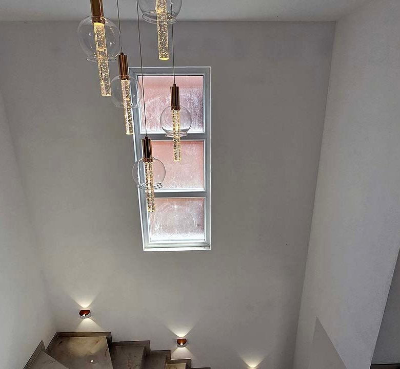 Stylish modern staircase in Ulcinj property with frosted glass, designer lights&mdash;investment via immorenta.me by ekosphere doo.