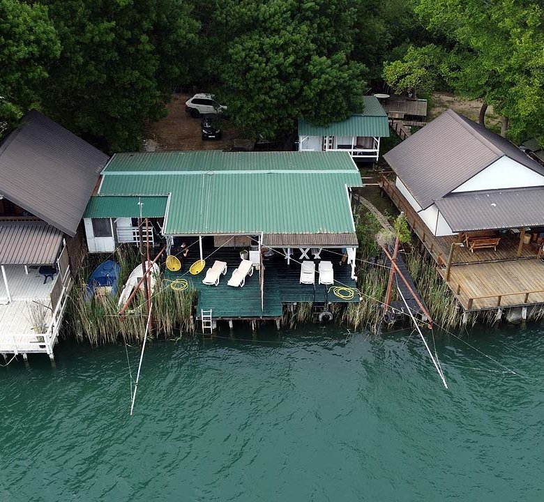 Exclusive waterfront cabins in Ulcinj, Montenegro with private decks, lush views&mdash;prime investment on immorenta.me by Ekosphere DOO.