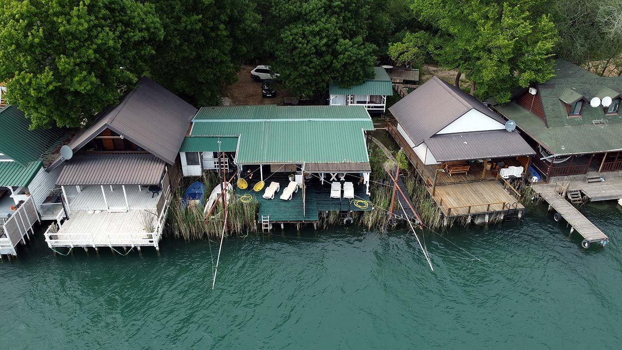 Exclusive waterfront cabins in Ulcinj, Montenegro with private decks, lush views&mdash;prime investment on immorenta.me by Ekosphere DOO.