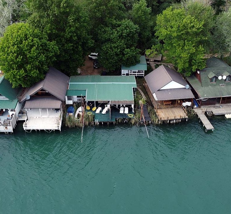 Prime Ulcinj real estate: waterfront homes, private docks, lush greenery. Invest via immorenta.me by Ekosphere DOO.