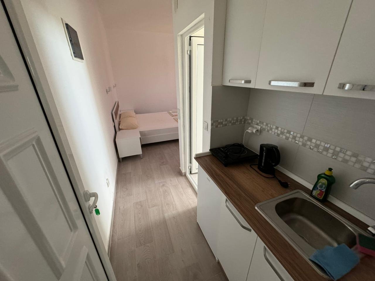 Modern compact apartment in Ulcinj, Montenegro&acirc;light interiors, open kitchen & bedroom. Exclusive at immorenta.me by ekosphere doo.