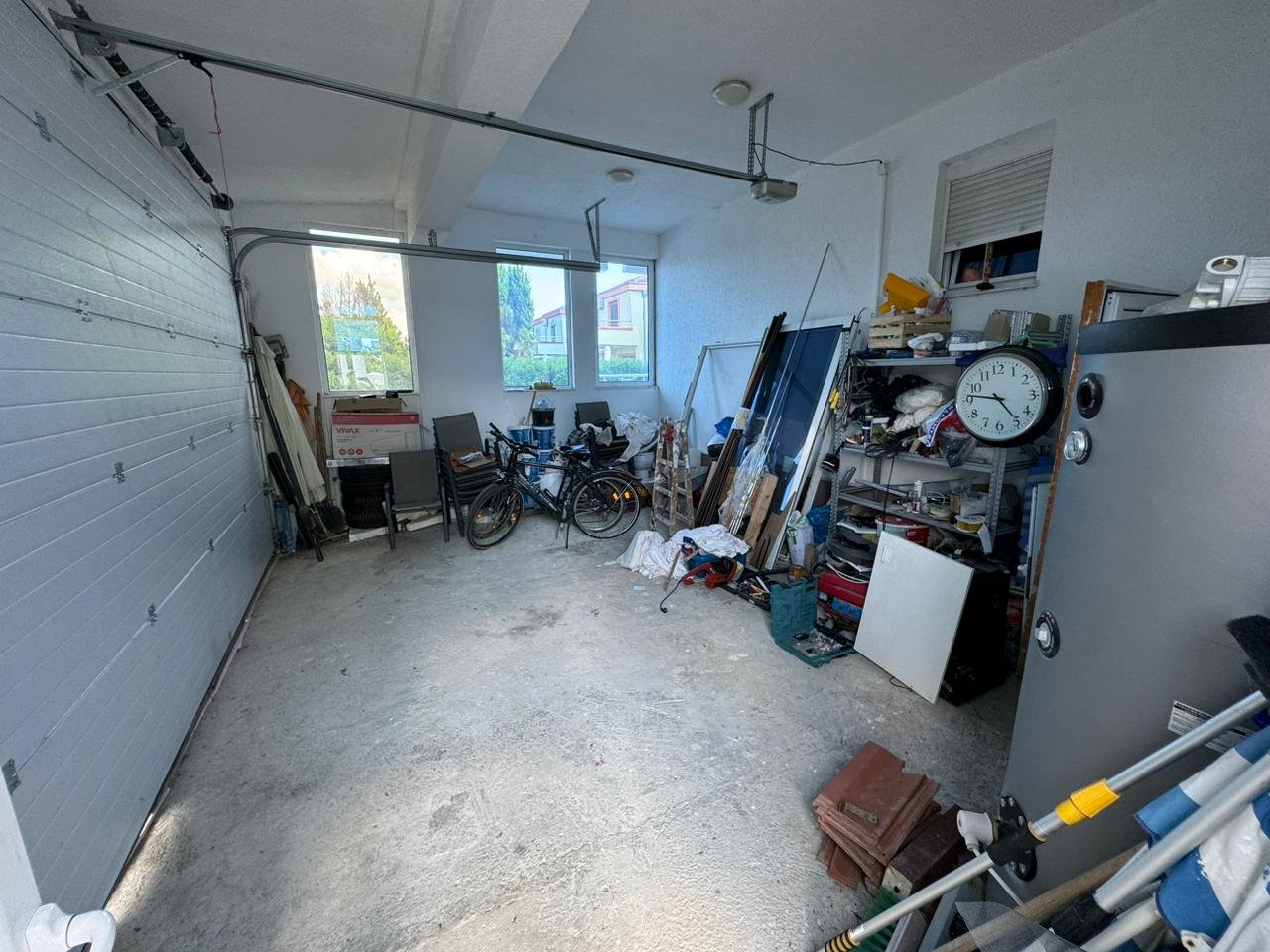 Spacious Ulcinj garage with concrete floor, two windows, and ample storage&acirc;ideal Montenegro investment. Listed by ekosphere doo.