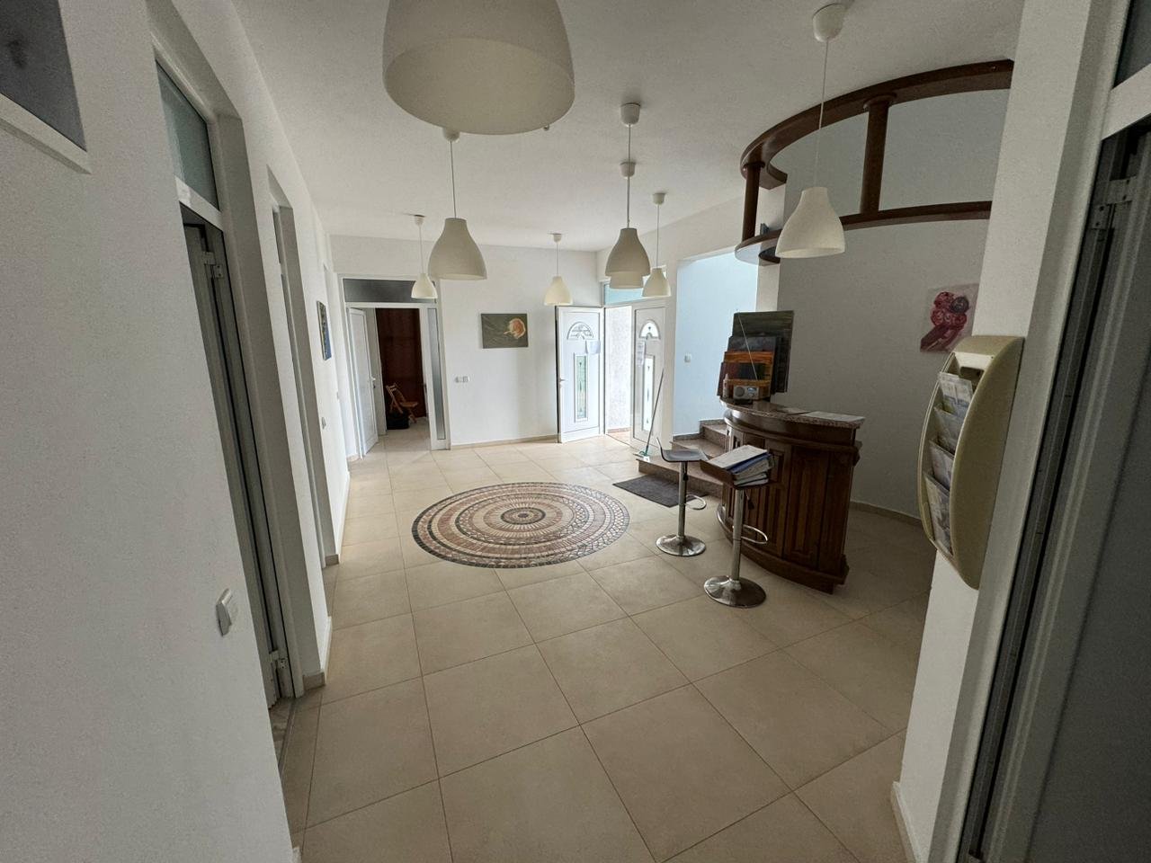 Discover this bright, eco-designed Ulcinj property with elegant beige tiles, pendant lighting, and premium finishes&acirc;immorenta.me by Ekosphere doo.