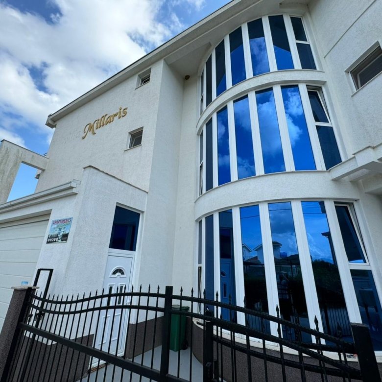 Contemporary &ldquo;Millaris&rdquo; property in Ulcinj, Montenegro&mdash;garage, modern design, blue windows. Listed by immorenta.me/ekosphere doo.