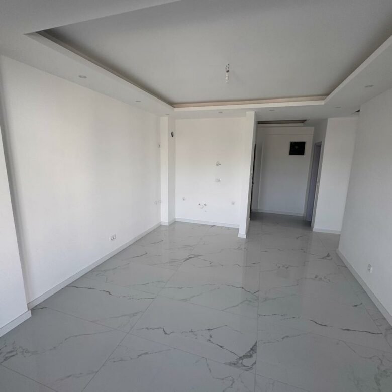 Modern, sunlit Ulcinj property with white walls, chic ceiling, marble floors&mdash;exclusive at immorenta.me by ekosphere doo.