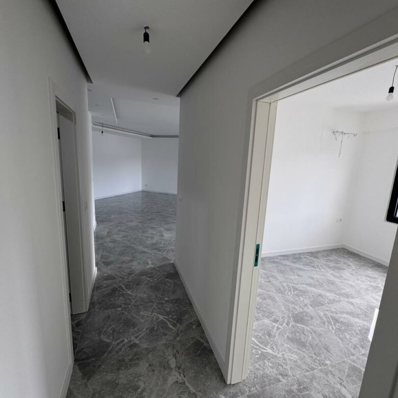 Modern Ulcinj property with elegant grey marble floors, large windows, and bright interiors&mdash;exclusive on immorenta.me by ekosphere doo.