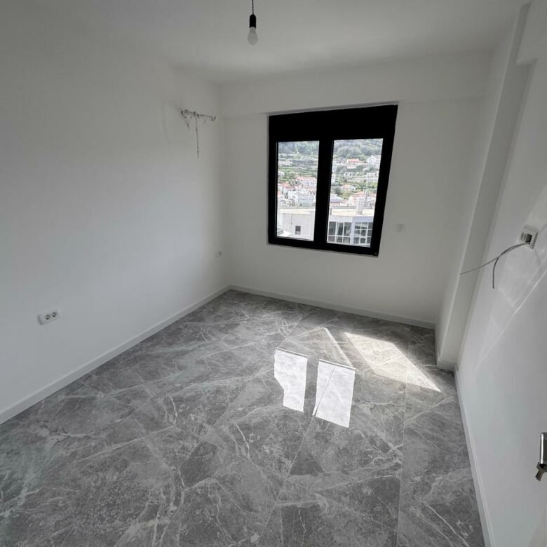 Spacious unfurnished room with city view in Ulcinj; top real estate investment on immorenta.me by Ekosphere doo.