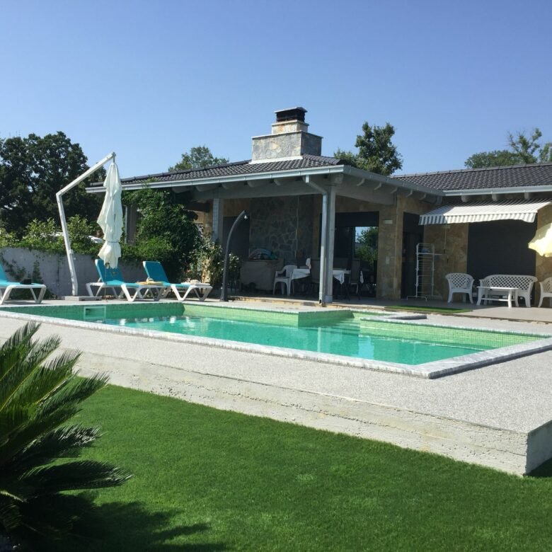 Luxury modern home in Ulcinj, Montenegro with pool, sun loungers, patio & lush yard. Invest via immorenta.me by ekosphere doo.