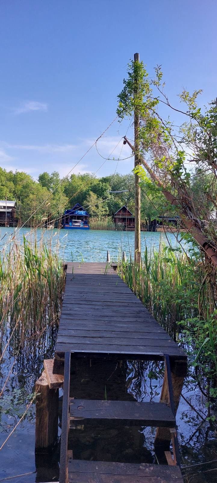 Lakefront houses in Ulcinj, Montenegro&mdash;exclusive real estate by immorenta.me (ekosphere doo), with private dock and lush views.