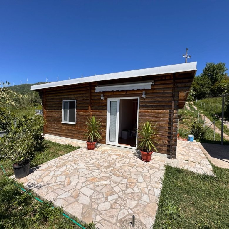 Discover your ideal Ulcinj getaway: a cozy wooden house amid lush greenery, offered by ekosphere doo on immorenta.me.