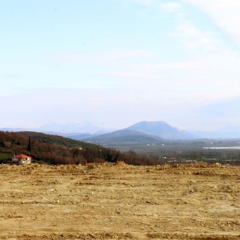 Prime cleared land in Ulcinj, Montenegro with scenic mountain views&mdash;ideal for investment. Listed on immorenta.me by Ekosphere doo.