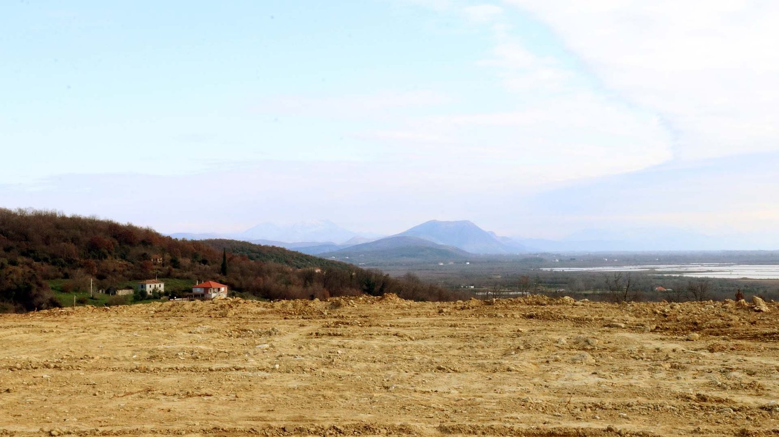 Prime cleared land in Ulcinj, Montenegro with scenic mountain views&mdash;ideal for investment. Listed on immorenta.me by Ekosphere doo.
