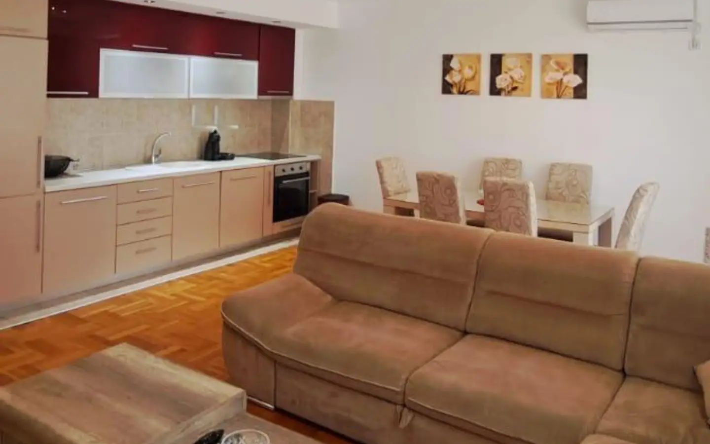 Modern open-plan living area in Ulcinj with stylish furnishings and kitchen&mdash;prime property listed by immorenta.me, Ekosphere doo.