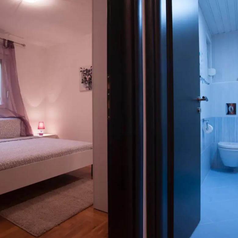 Discover this Ulcinj, Montenegro property: bright bedroom with double bed & ensuite bath&mdash;exclusive on immorenta.me by ekosphere doo.