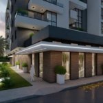 Modernes mehrst&ouml;ckiges Anwesen in Ulcinj mit Backsteinfassade, ger&auml;umigen Balkonen mit Gr&uuml;nfl&auml;chen und hellen Fenstern &ndash; exklusiv auf immorenta.me von ekosphere doo.