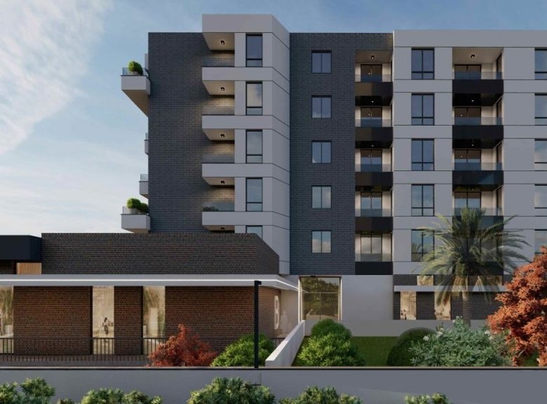 Contemporary Ulcinj apartment building with balconies, large windows, and lush greenery&mdash;exclusive property from immorenta.me, a project by ekosphere doo.