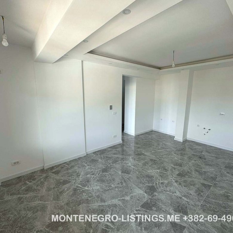 Spacious, sunlit room in Ulcinj with marble floors, large window&mdash;prime Montenegro property via immorenta.me by Ekosphere doo.