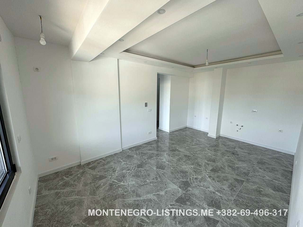 Spacious, sunlit room in Ulcinj with marble floors, large window&mdash;prime Montenegro property via immorenta.me by Ekosphere doo.