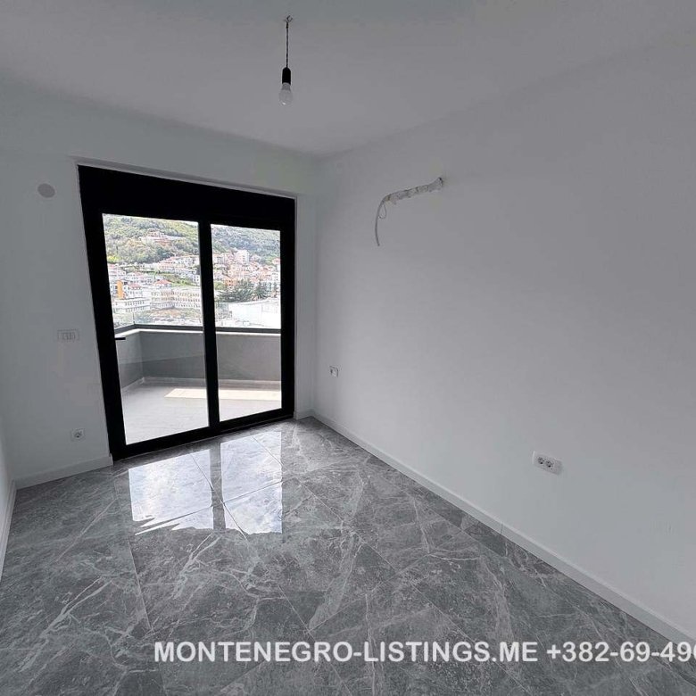 Spacious, sunlit room in Ulcinj with marble floors, balcony & hill views&mdash;rare Montenegro property. Visit immorenta.me by ekosphere doo.