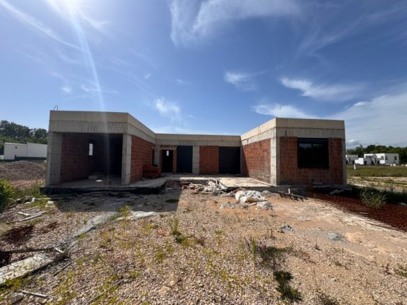 Unfinished single-story brick home on a spacious lot in Ulcinj, Montenegro&mdash;ideal real estate investment by Ekosphere, via immorenta.me.