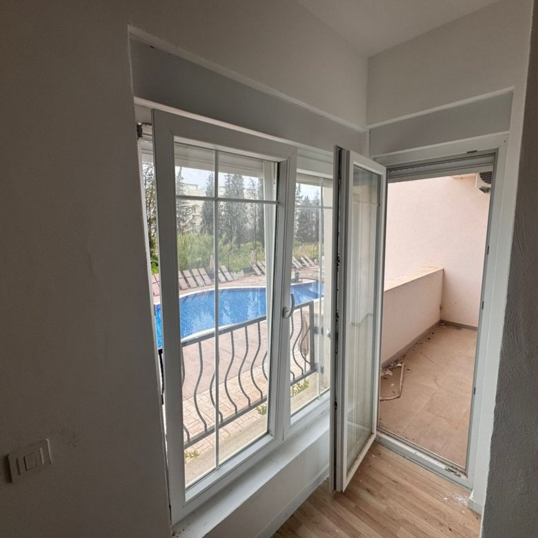 Spacious, sunlit Ulcinj room with balcony, pool, and lush views&mdash;a prime investment via immorenta.me by Ekosphere doo.