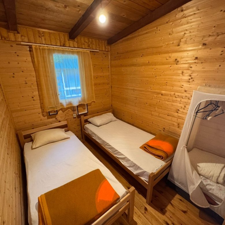 Charming wooden room in Ulcinj with 2 beds, bright natural light&mdash;ideal cozy property, great investment via immorenta.me.