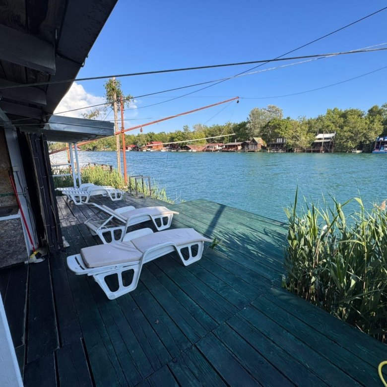 Luxury wooden deck with lounge chairs, river views, and prime Ulcinj real estate. Invest in Montenegro-listings.me by ekosphere doo.