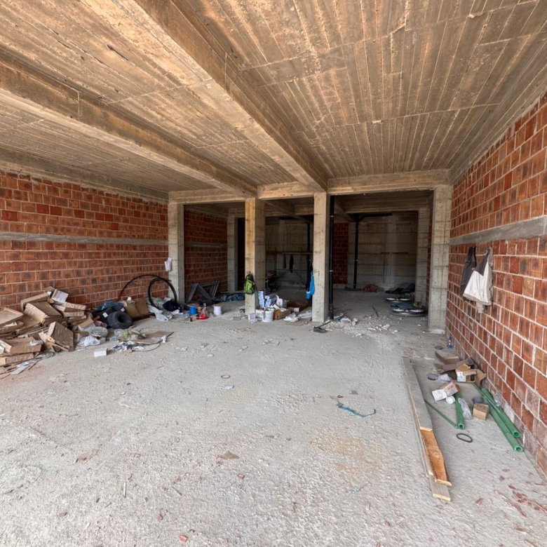 Prime investment opportunity in Ulcinj: unfinished space with exposed brick, concrete floors, open layout&mdash;immorenta.me by ekosphere doo.