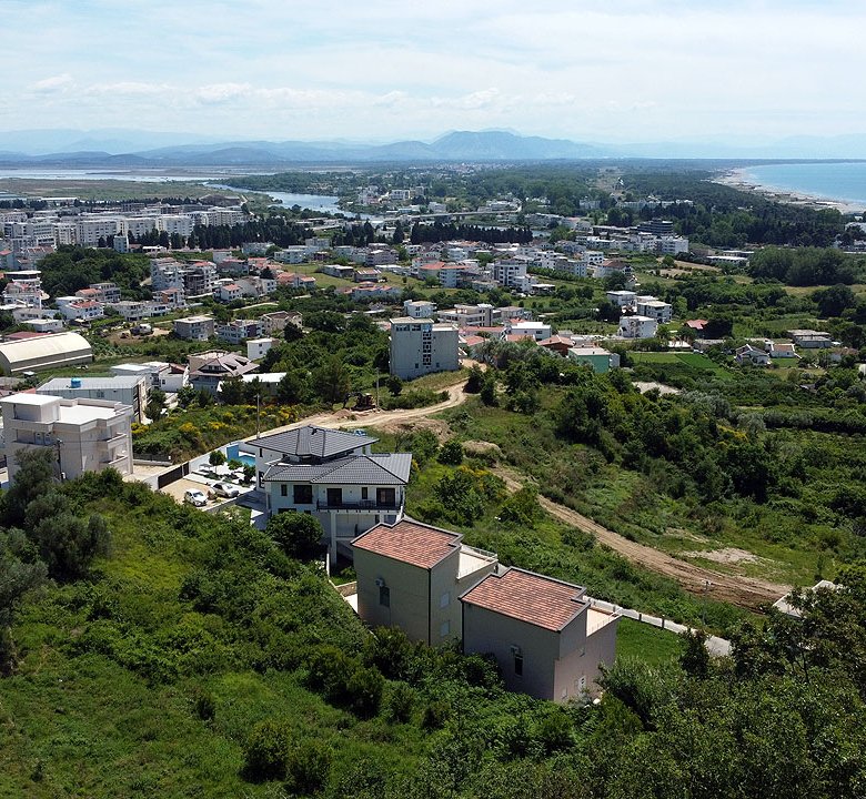 Invest in Ulcinj, Montenegro&mdash;luxury white homes set among hills, beach, and ocean views. Exclusively at immorenta.me by ekosphere doo.