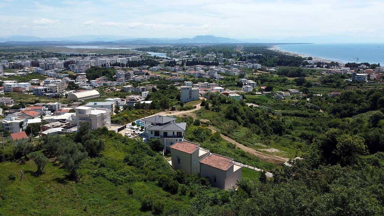 Invest in Ulcinj, Montenegro&mdash;luxury white homes set among hills, beach, and ocean views. Exclusively at immorenta.me by ekosphere doo.