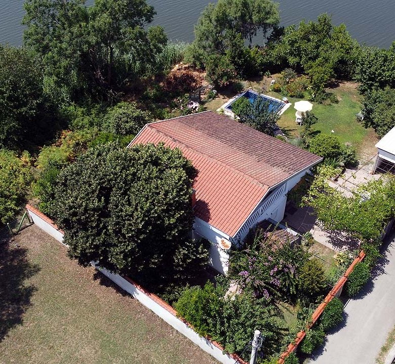 Stunning Ulcinj villa with red-tiled roof, lush garden, private patio & water views&mdash;exclusive on immorenta.me by Ekosphere DOO.