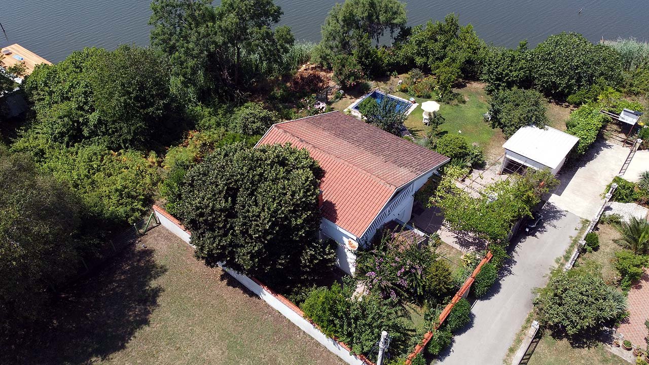 Stunning Ulcinj villa with red-tiled roof, lush garden, private patio & water views&mdash;exclusive on immorenta.me by Ekosphere DOO.