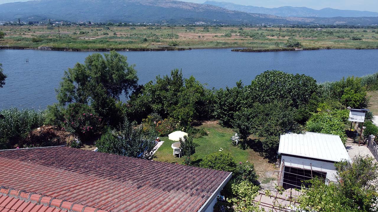 Stunning Ulcinj property: lush riverside garden, mountain views, ideal investment from ekosphere doo at immorenta.me.