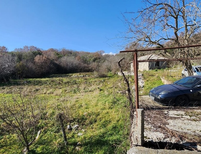 Prime Ulcinj Montenegro real estate: spacious grassy plot with panoramic hill views, ideal for investment. Ekosphere doo project.