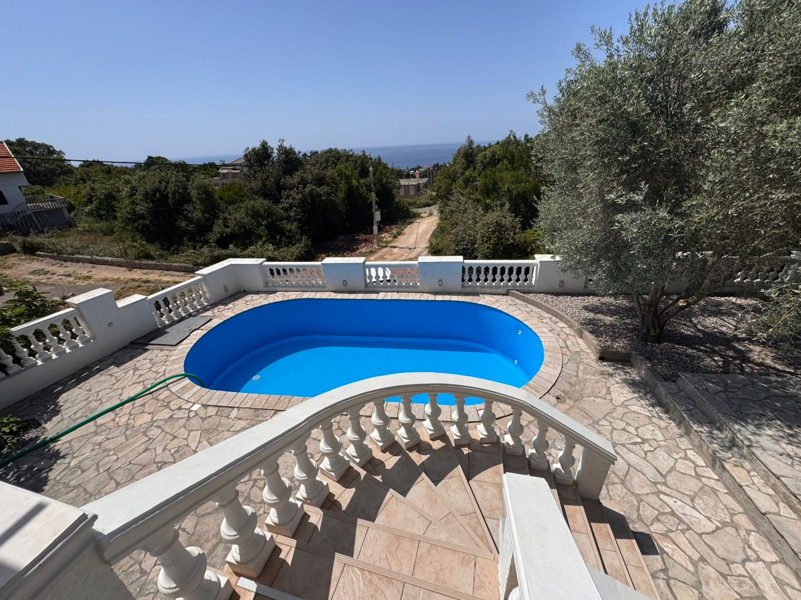 Listings for Sale - Stunning Ulcinj property: tiled stairs, private pool, stone patio & lush gardens. Invest now via immorenta.me by ekosphere doo.
