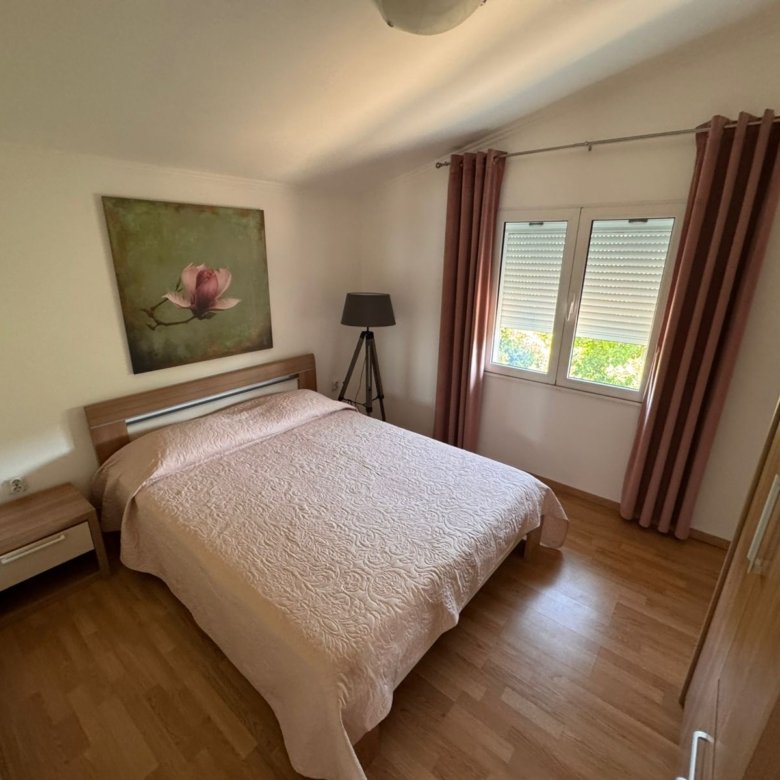 Modern Ulcinj bedroom with double bed, pink accents, stylish decor, ideal investment. See more at immorenta.me by ekosphere doo.