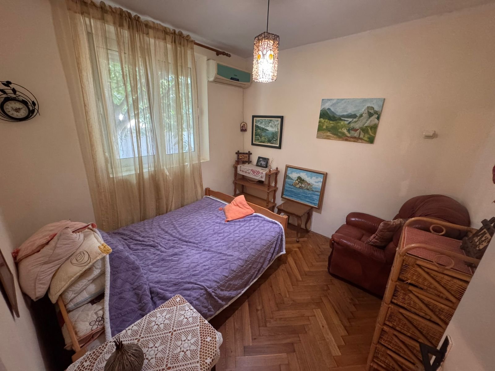 Charming Ulcinj bedroom with a single bed, quality wood furniture, airy curtains&mdash;ideal Montenegro investment at immorenta.me by ekosphere doo.