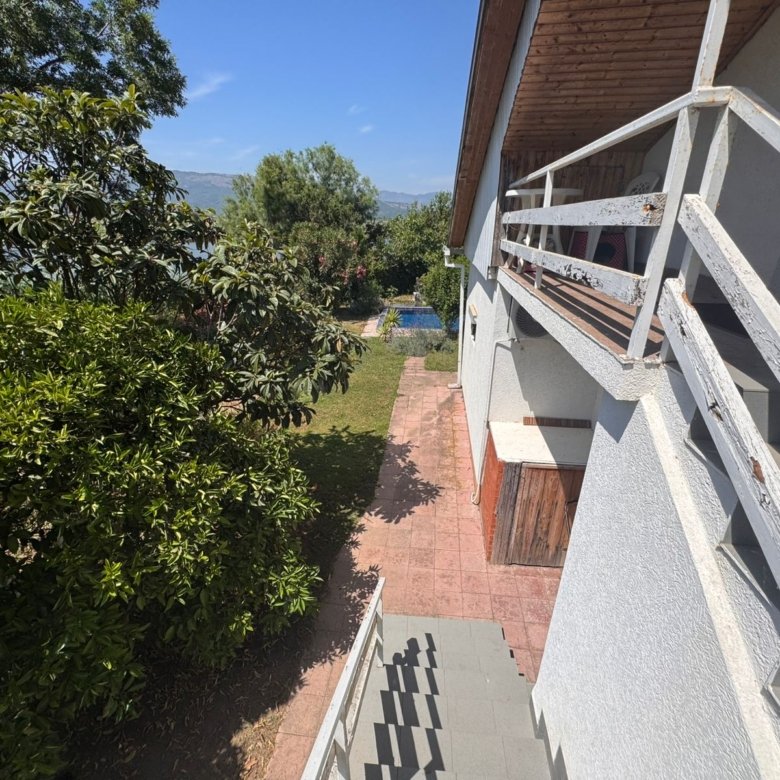 Stunning Ulcinj property: panoramic patio, lush lawn, pool views&mdash;exclusive Ekosphere DOO listing at immorenta.me.