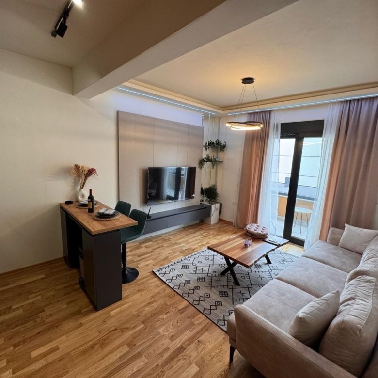 Elegant modern living room in Ulcinj, Montenegro with balcony&mdash;prime investment from immorenta.me by ekosphere doo.