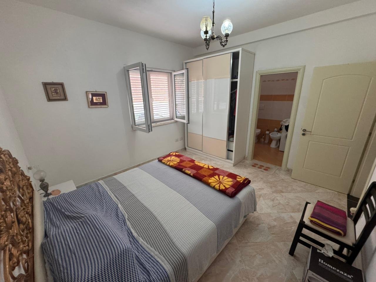 Modern Ulcinj bedroom with double bed, chic wardrobe, and sunny windows&mdash;ideal eco-real estate. Listed by immorenta.me/Ekosphere.