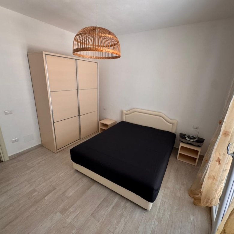 Modern Ulcinj bedroom with stylish double bed, chic decor, and balcony&mdash;exclusive property by immorenta.me (ekosphere doo).