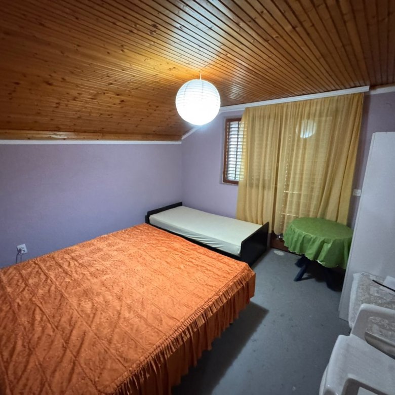 Invest in Ulcinj, Montenegro: cozy bedroom with wooden ceiling, double and single beds, quality furnishings&mdash;only at immorenta.me by ekosphere doo.