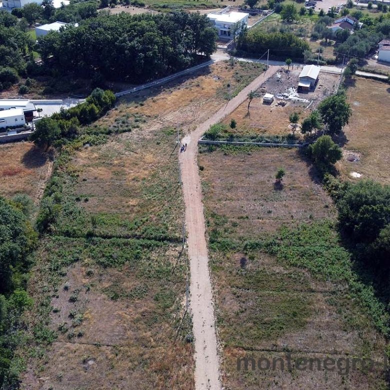 Prime aerial view of Ulcinj, Montenegro real estate&mdash;expansive plots, scenic greenery, and investment properties by ekosphere doo.