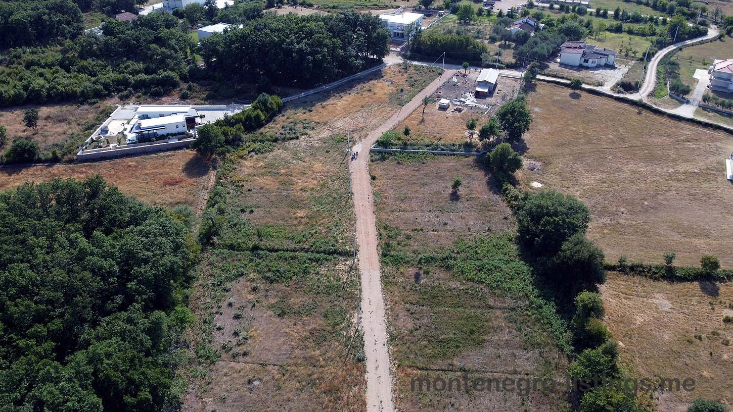 Prime aerial view of Ulcinj, Montenegro real estate&mdash;expansive plots, scenic greenery, and investment properties by ekosphere doo.