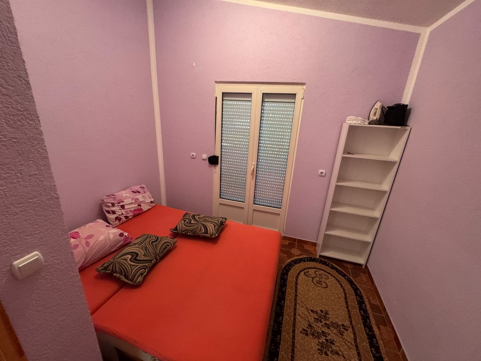 Stylish Ulcinj Montenegro bedroom: chic double bed, vibrant decor, ideal property investment via immorenta.me by ekosphere doo.