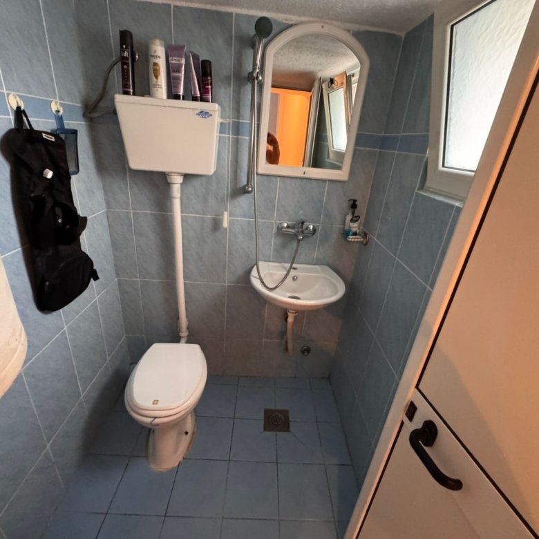 Modern blue-tiled bathroom with premium fixtures in Ulcinj, Montenegro&acirc;ideal property investment by ekosphere doo on immorenta.me.