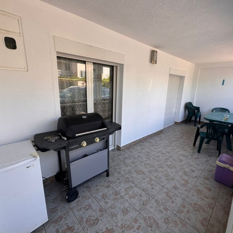 Luxurious covered patio in Ulcinj, Montenegro with tiled floors, grill, fridge&acirc;exclusive listing via immorenta.me by ekosphere doo.