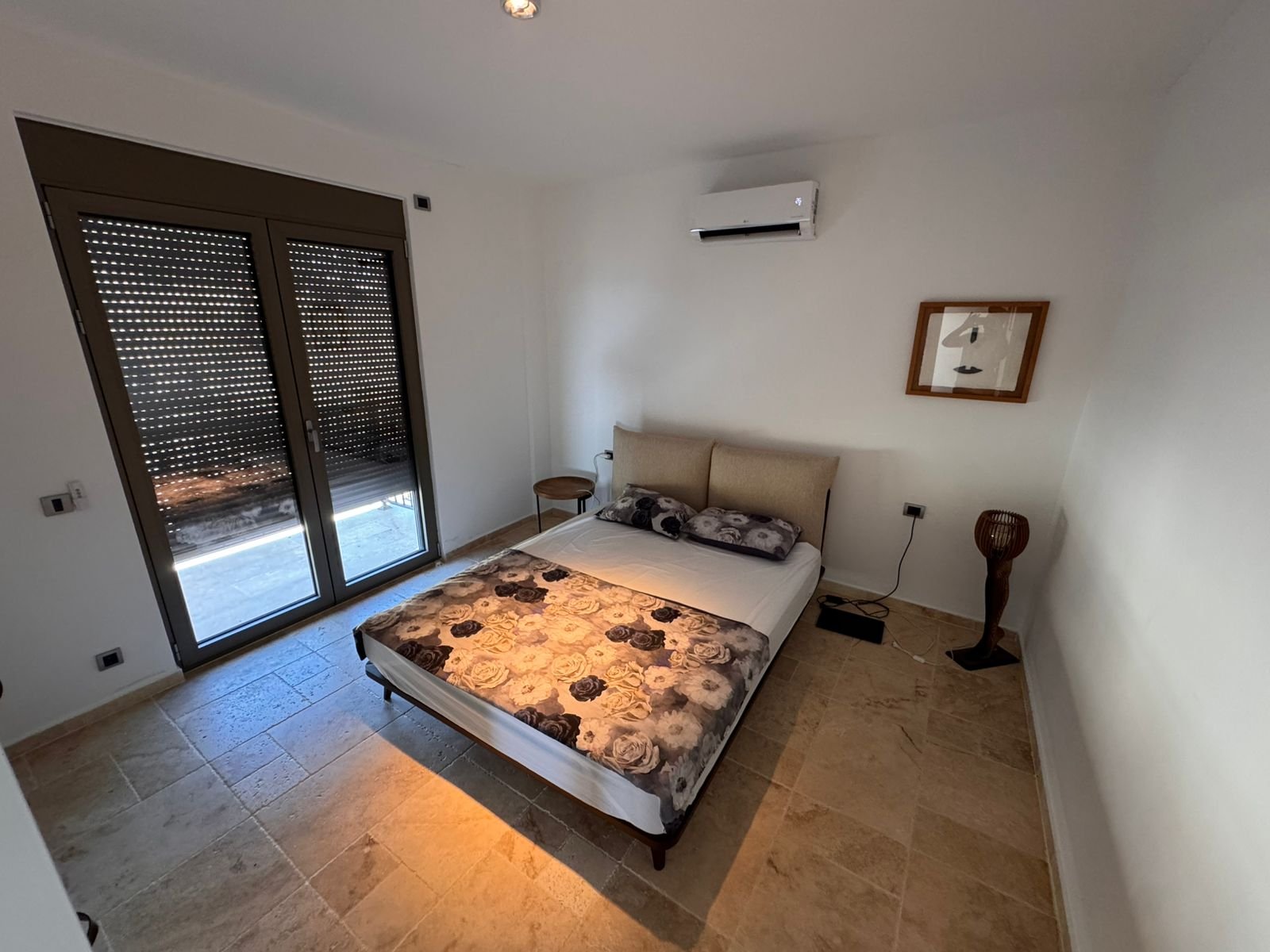 Modern Ulcinj bedroom with double bed, AC, bright window, stylish decor&mdash;prime investment on immorenta.me by Ekosphere doo.